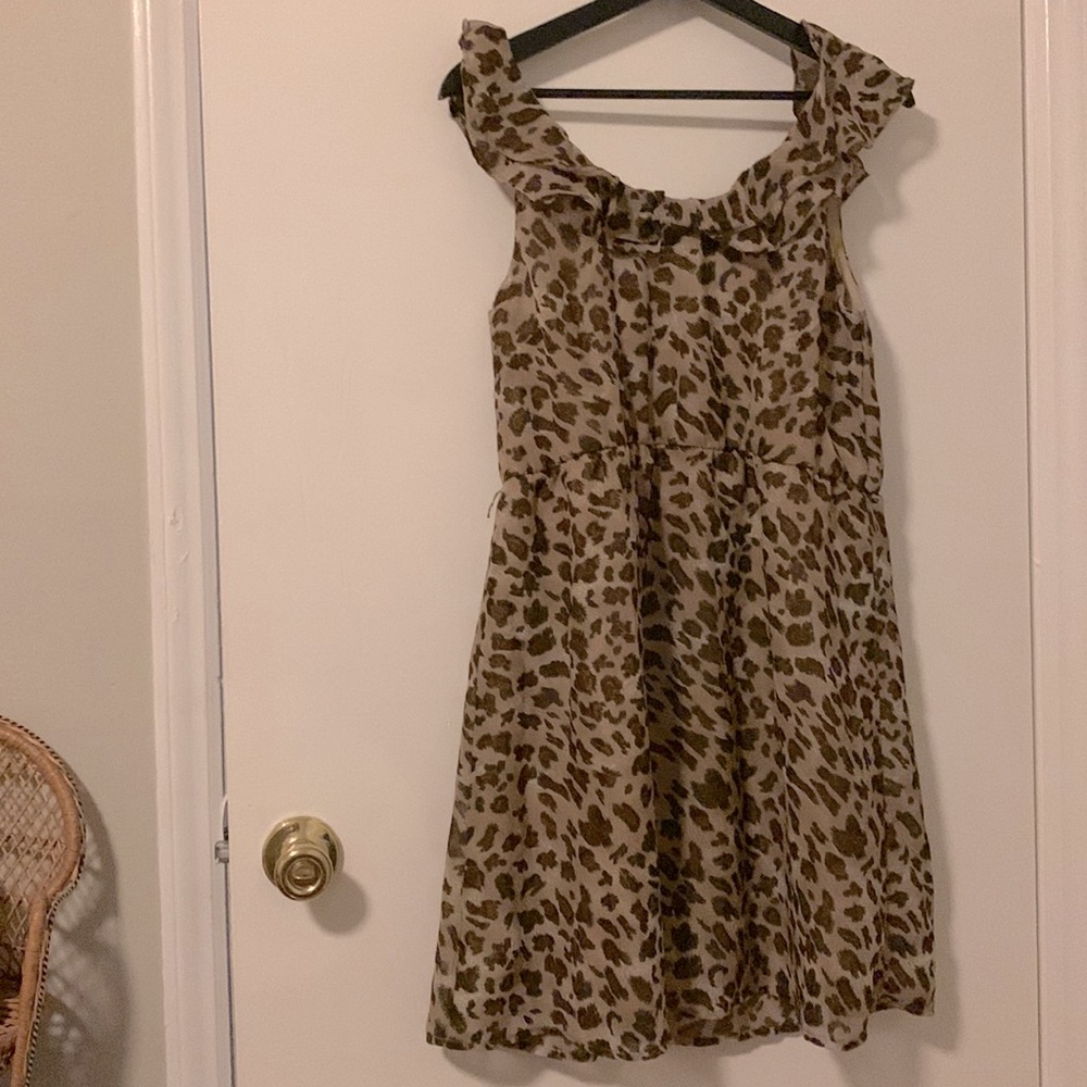 Leopard ruffle  short sleeves  size large.